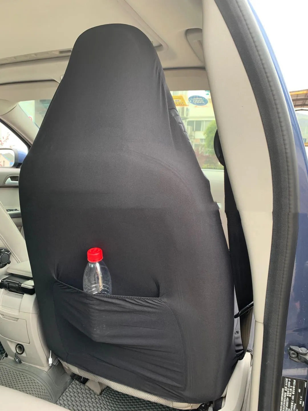 Black quilted automotive seat cover set with PU and polyester construction for bench seat protection