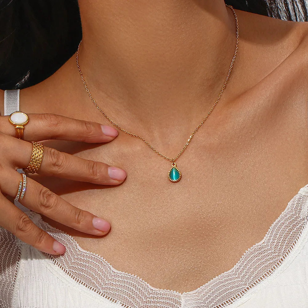 Minimalistic water drops opal earrings and necklace set in stainless steel electroplated finish geometric design