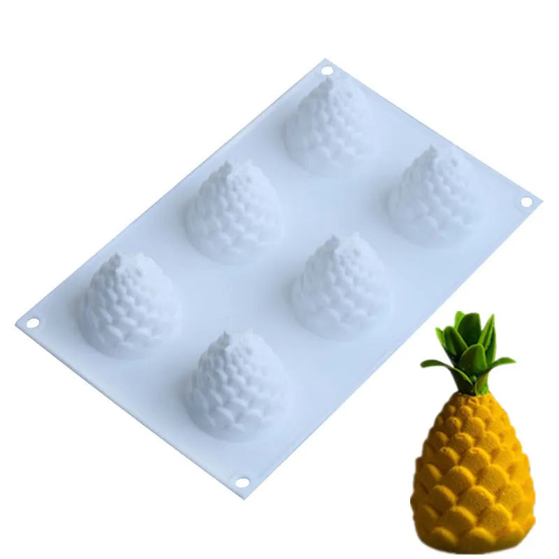 Silicone baking mould with six cavities shaped as pine cones, pineapples, and pears