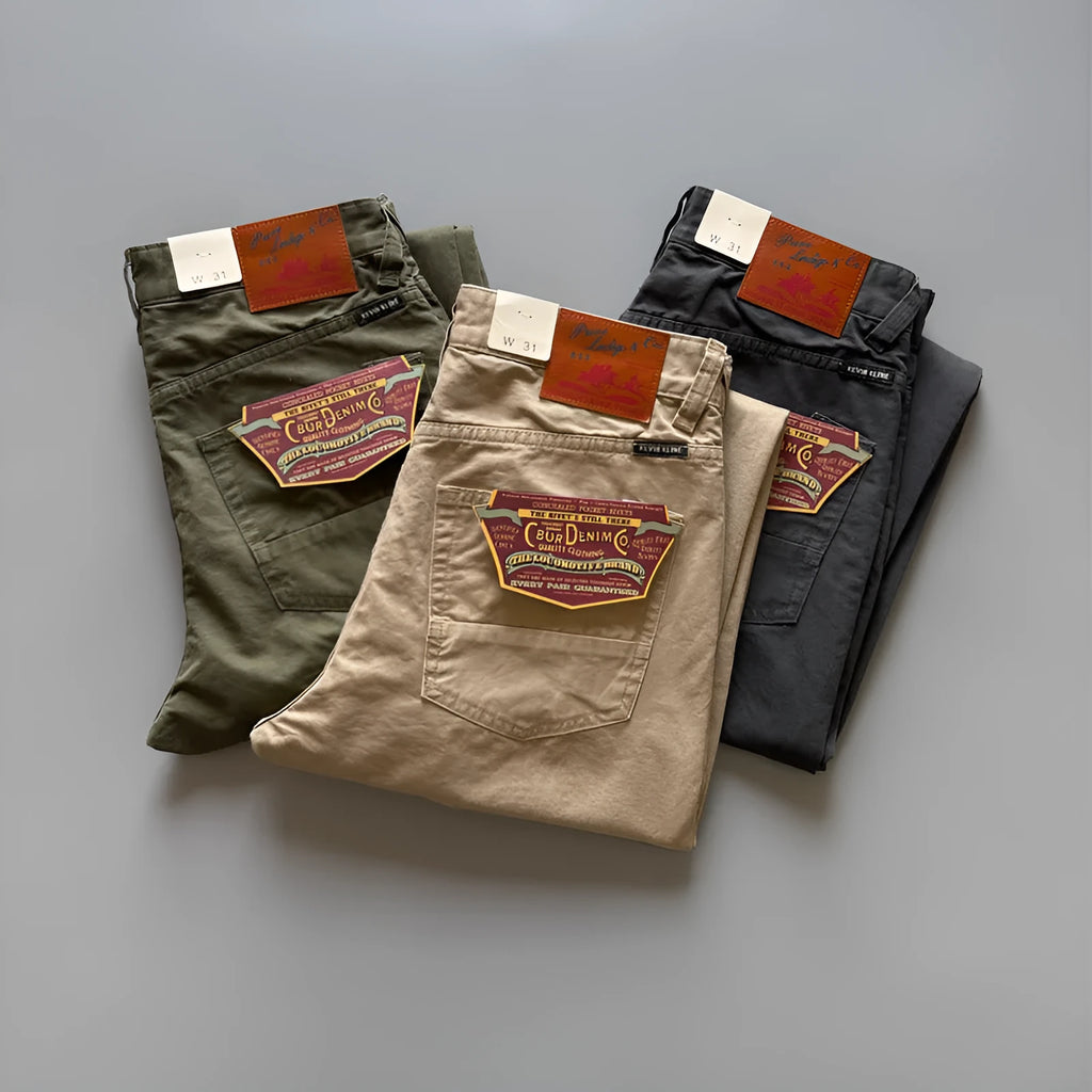 Men's straight-leg cotton casual trousers in khaki colour, laid flat to show mid-waist and straight cut.