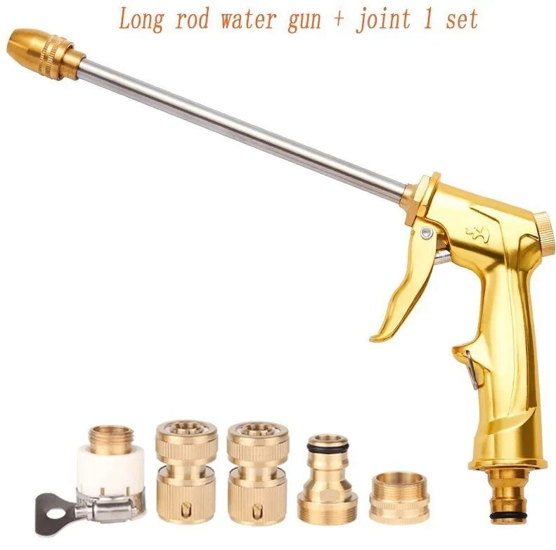 Gold high-pressure car wash water gun with copper head and aluminium alloy handle on a white background