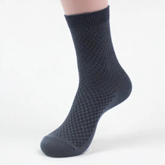 Men's bamboo fibre socks showing small square pattern in one of five available colours.