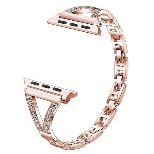 Stainless steel watch band with diamond accents in gold, showing the metal clasp and stud detail.