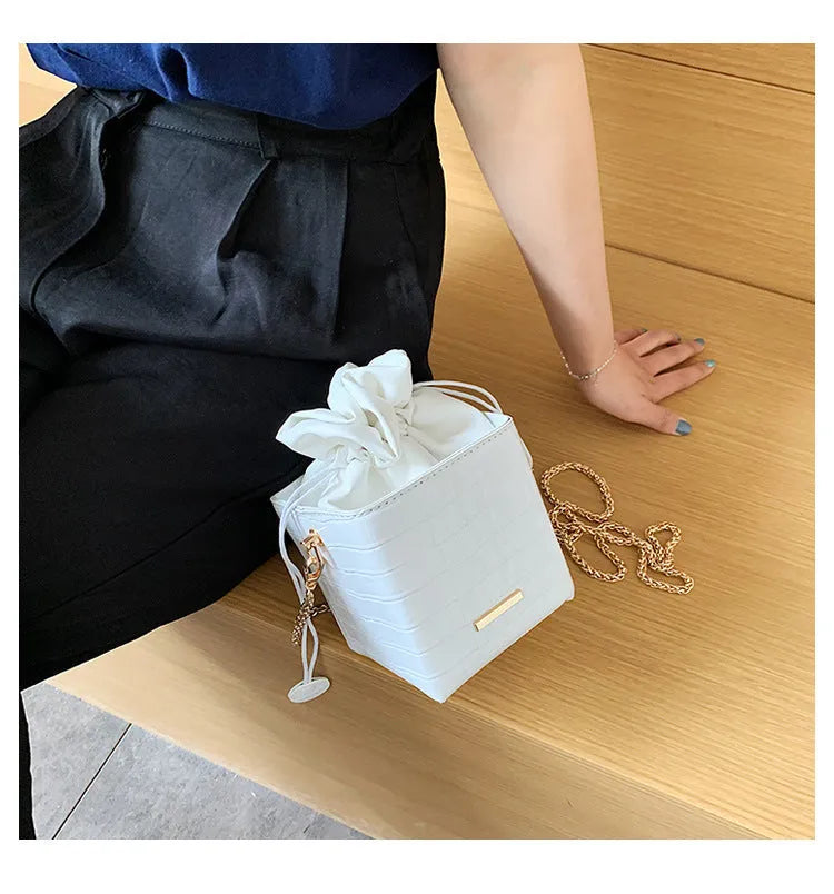 Small Korean-style chain messenger bag with drawstring closure in multiple colour options