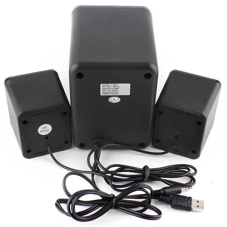 Green U-2600 2.1 USB computer speaker with illuminated colourful LED lights on a desk