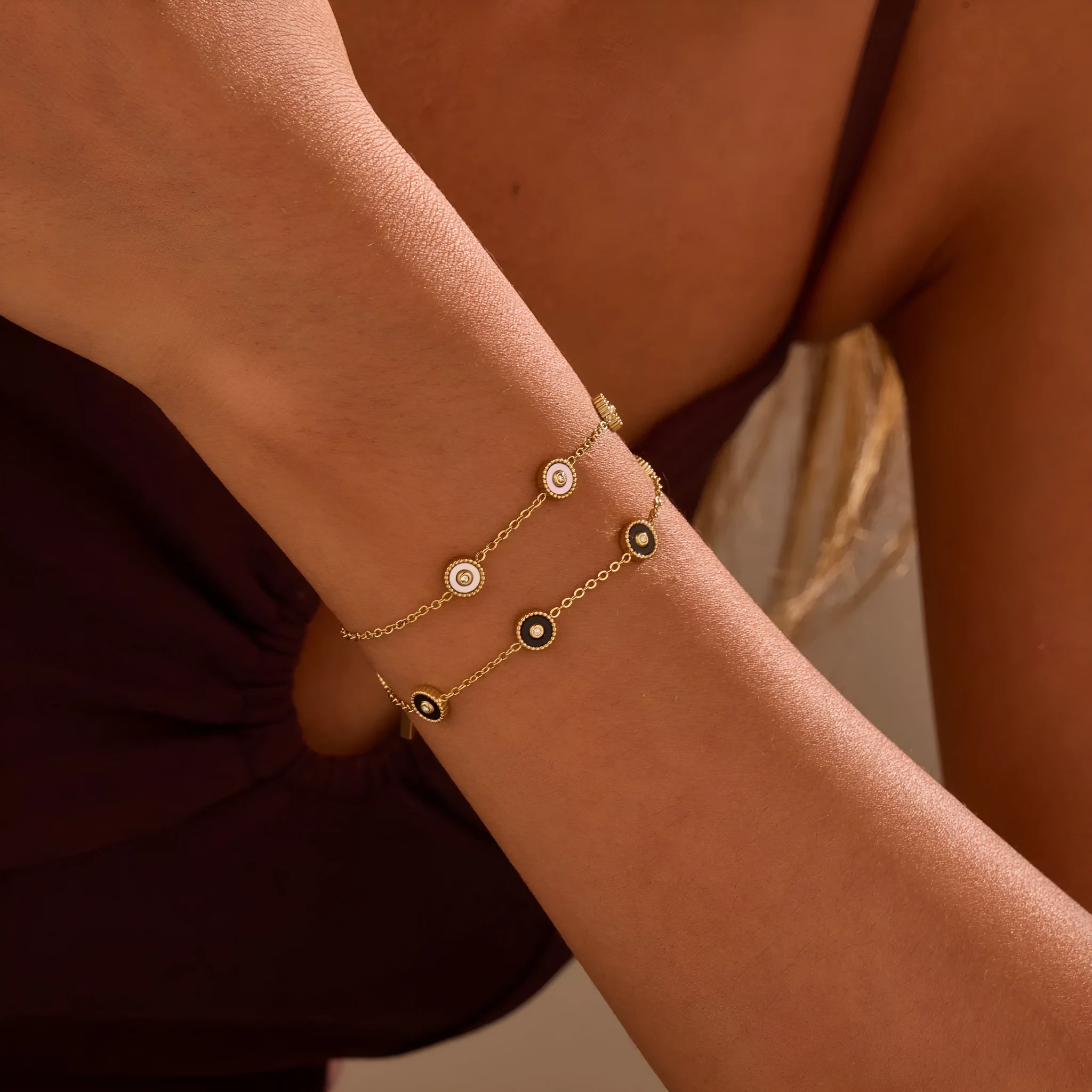 Geometric fritillary design stainless steel bracelet with 18K gold plating and matching necklace