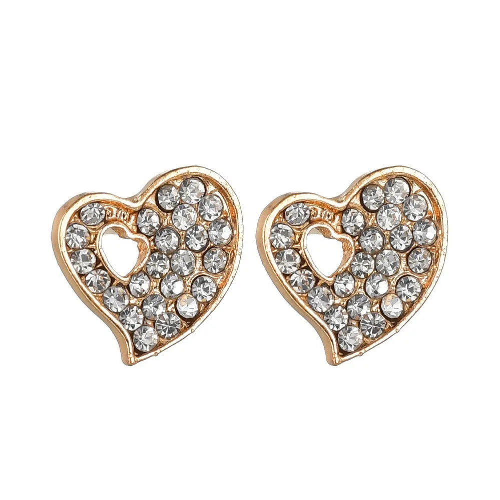 Gold-tone women's jewellery set with adjustable necklace, earrings, and hand decoration featuring love heart pendant