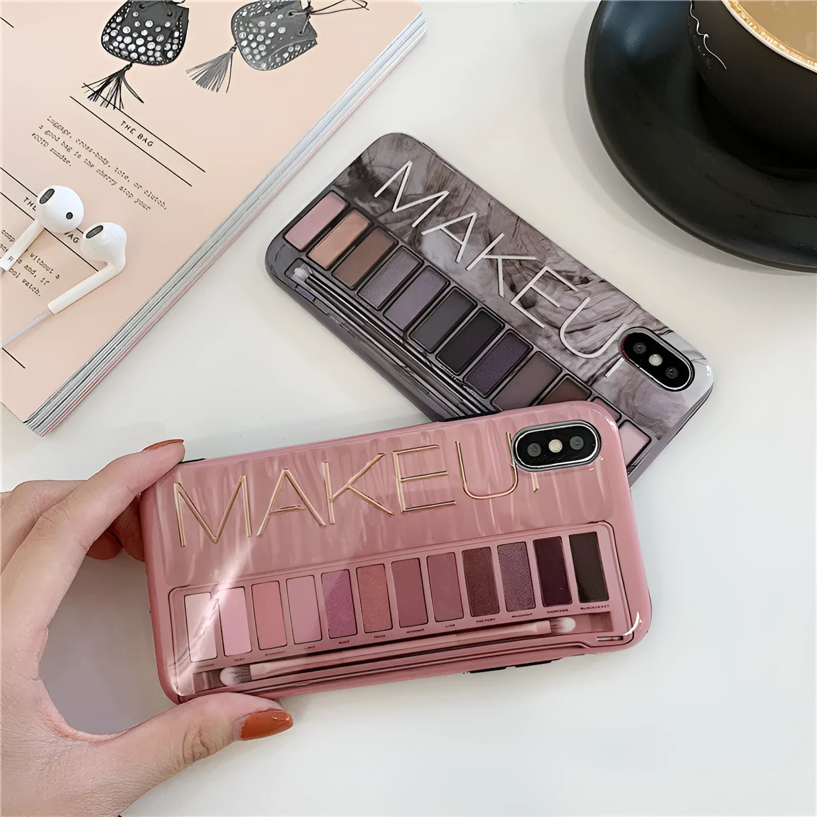 Silicone iPhone case with an eye shadow pattern design in flesh and grey colour options.