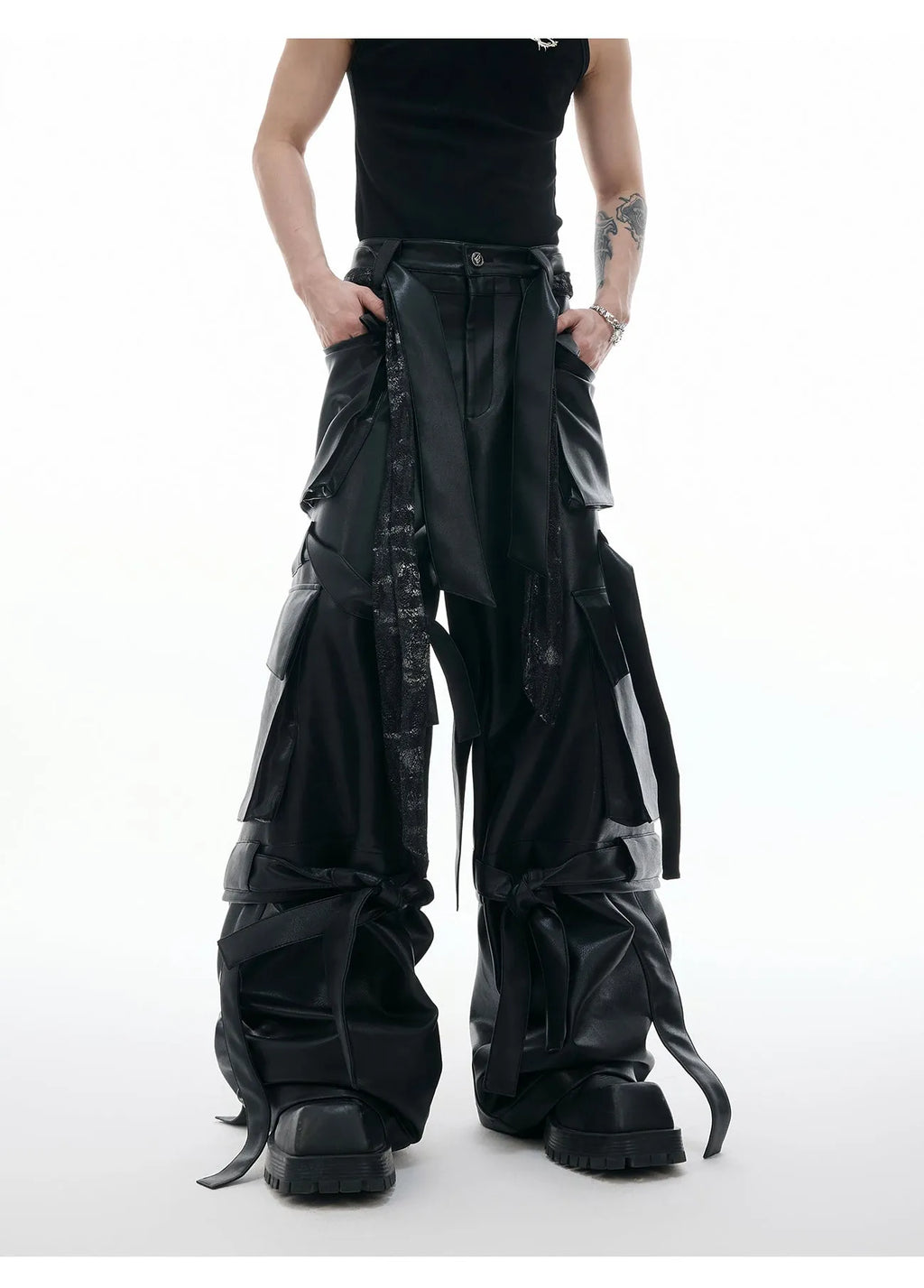 Black loose-fit retro leather pants with multiple pockets and quilted stitching detail