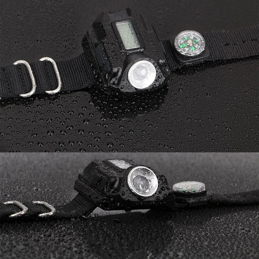 Black LED watch flashlight on wristband with compass and time display