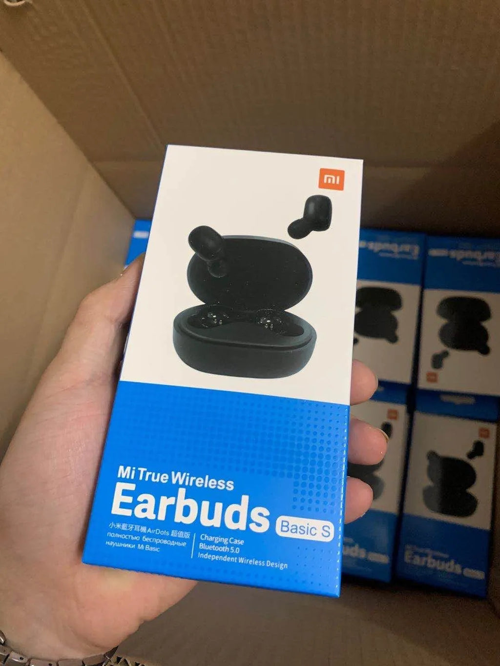 Redmi AirDots 2 Black true wireless earphones with their compact charging case.