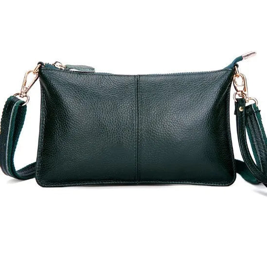 Structured cowhide leather lady slant bag showing front zipper compartment and dual strap options