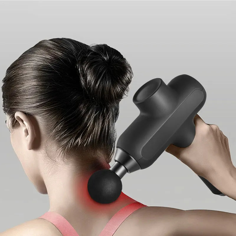 Deep tissue massage gun with six interchangeable heads showing compact 25x20x6cm design