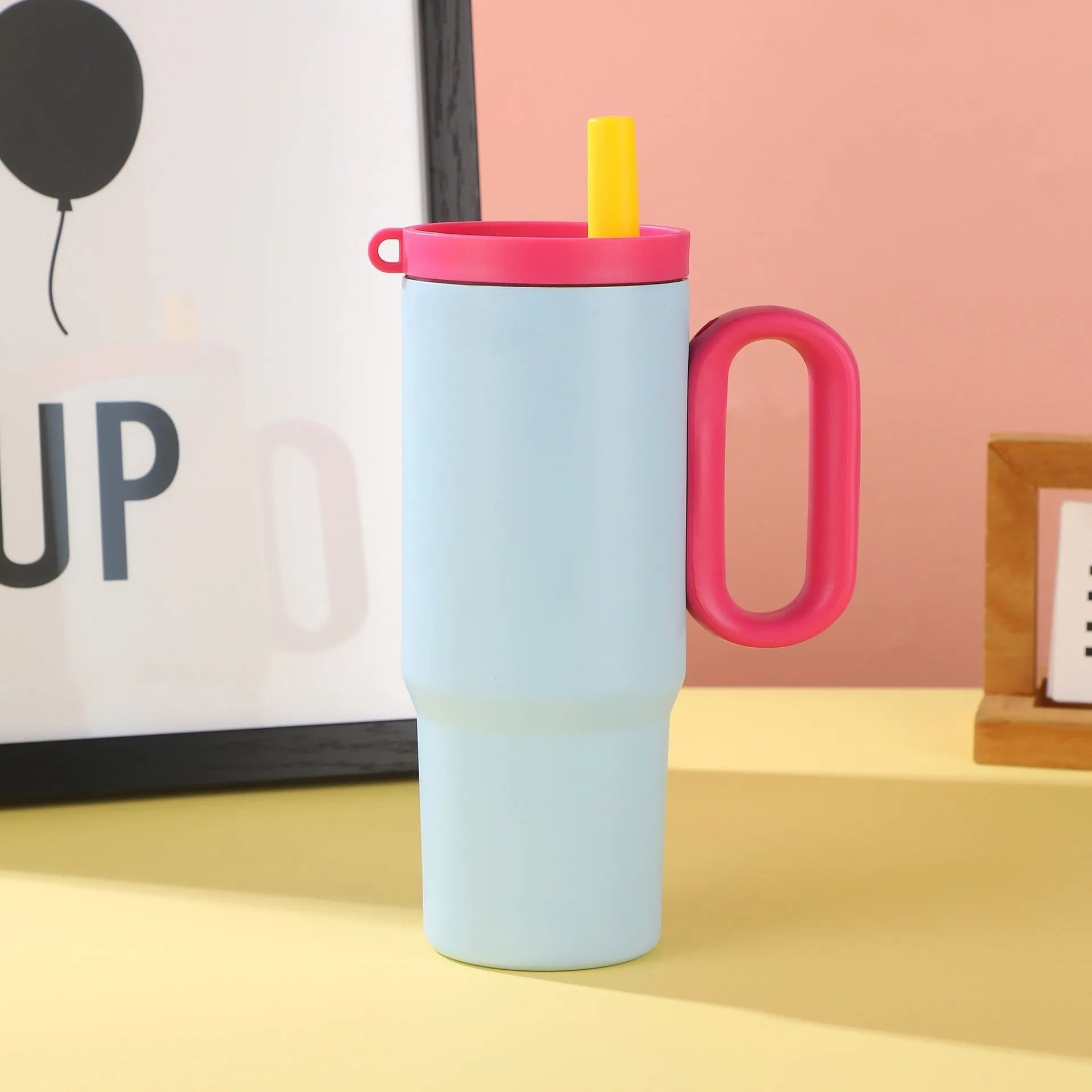 Large capacity insulated straw cup with handle in choice of five colours showing vacuum insulation technology