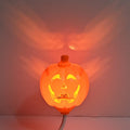 Plastic pumpkin lamp with USB cable for seasonal decoration in yellow or purple light