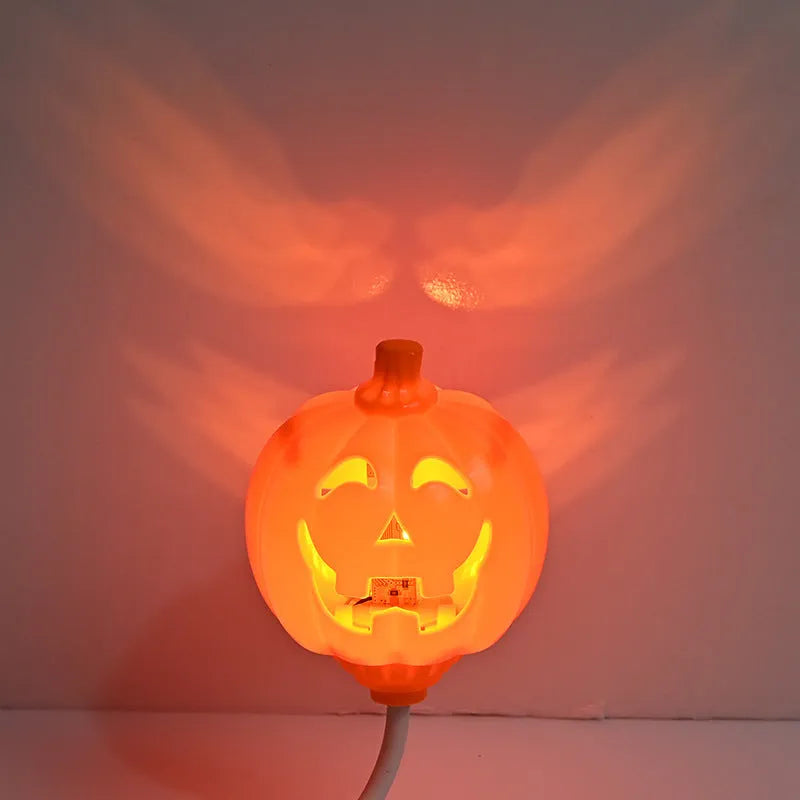 Plastic pumpkin lamp with USB cable for seasonal decoration in yellow or purple light