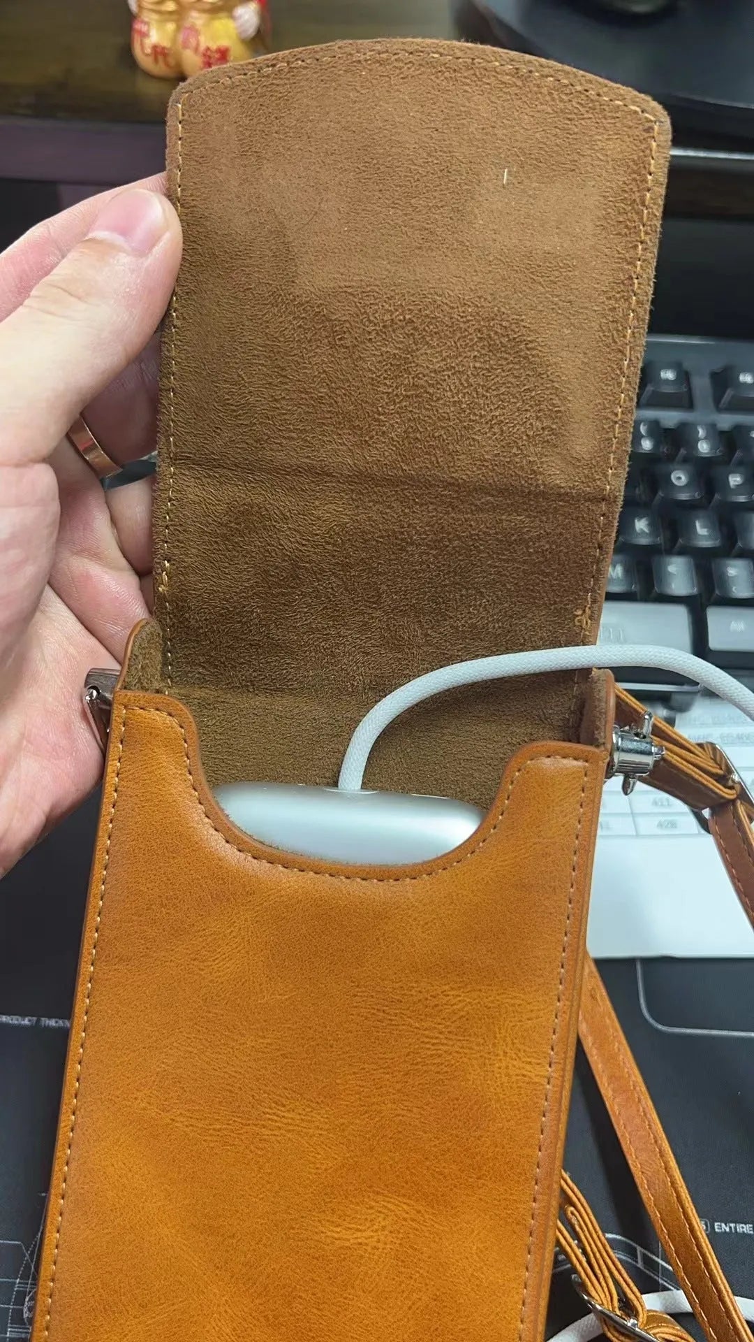 Brown leather storage bag for Apple Vision Pro power supply
