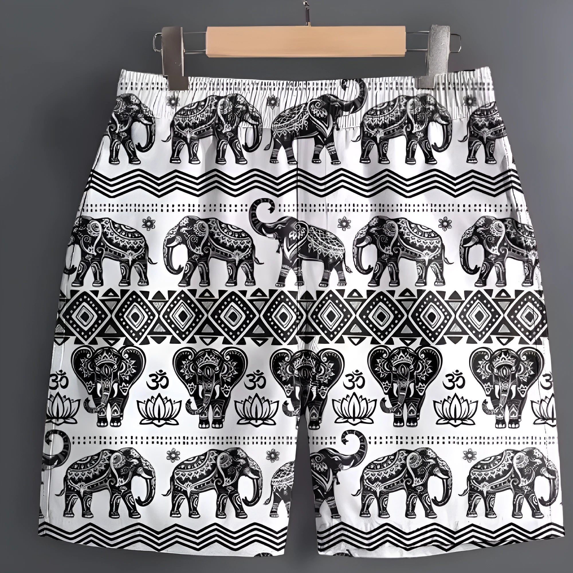 Men's casual polyester shorts in camouflage print, laid flat to show size and pattern.