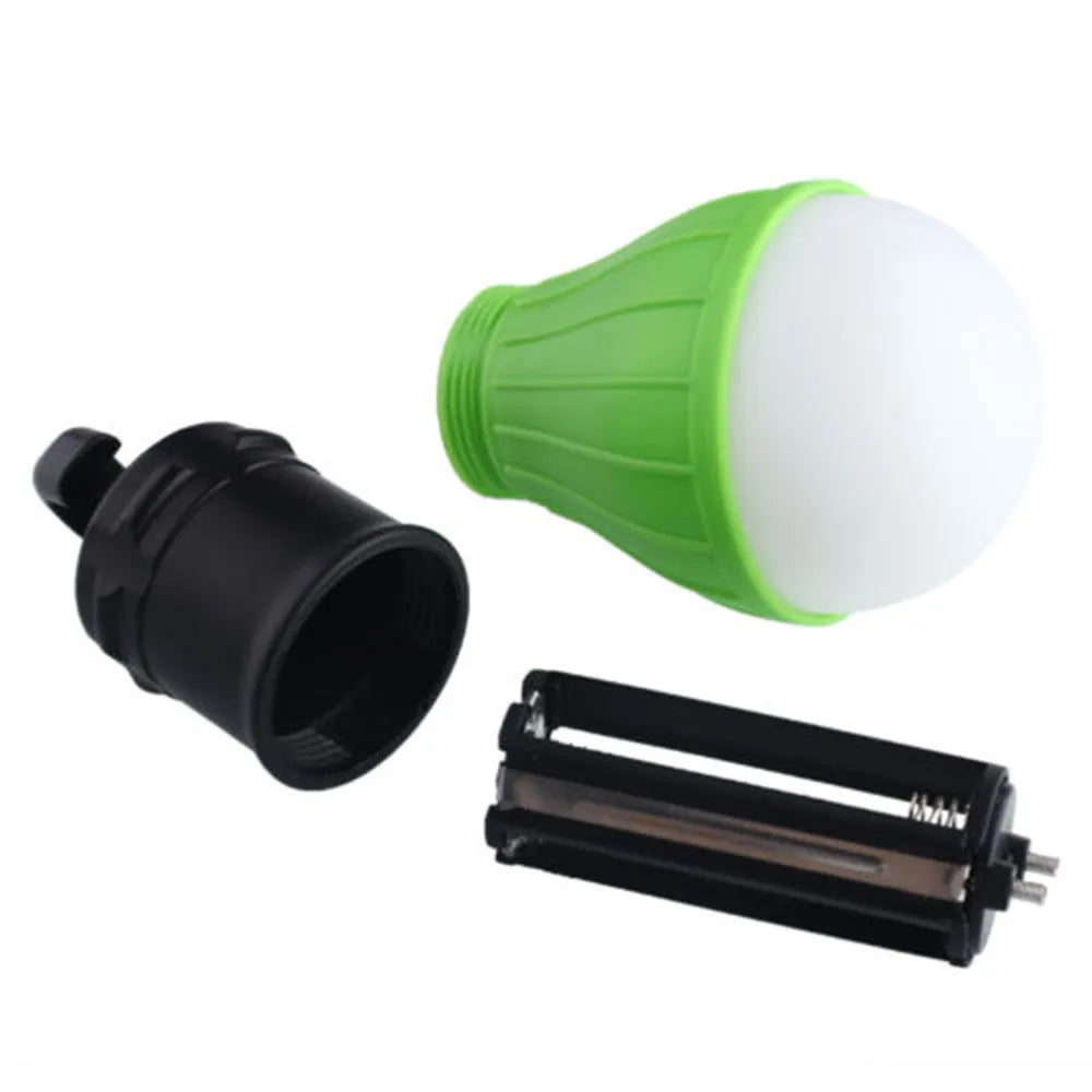 Blue portable LED camping light with a hanging hook, showing scale against a ruler.