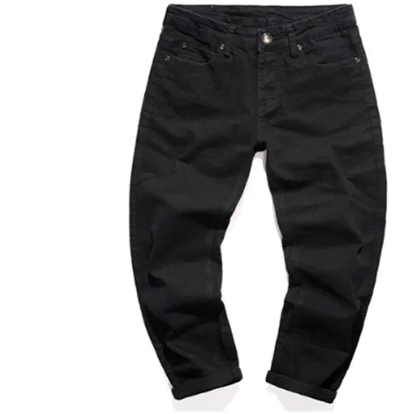 Slim-fit stretch cotton men's pants in black, laid flat showing tight cut and full length
