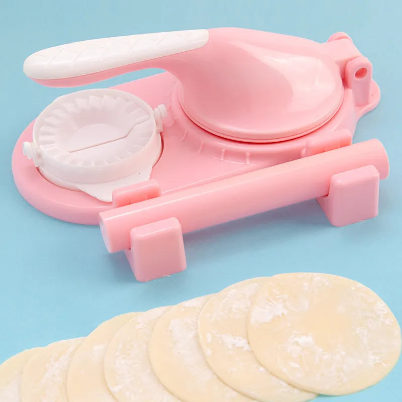 3 in 1 plastic dumpling maker with ergonomic handle and rolling pin in white on a table