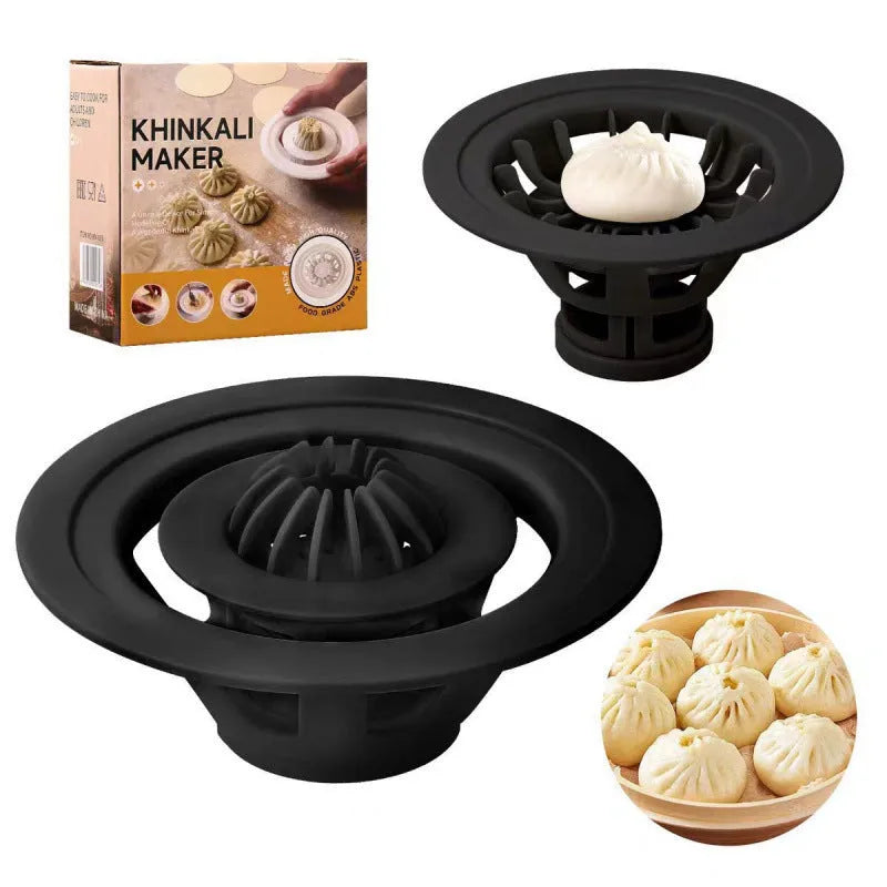 Set of four black plastic steamed bun moulds for shaping baozi and dumplings