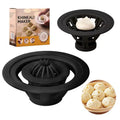 Set of four black plastic steamed bun moulds for shaping baozi and dumplings