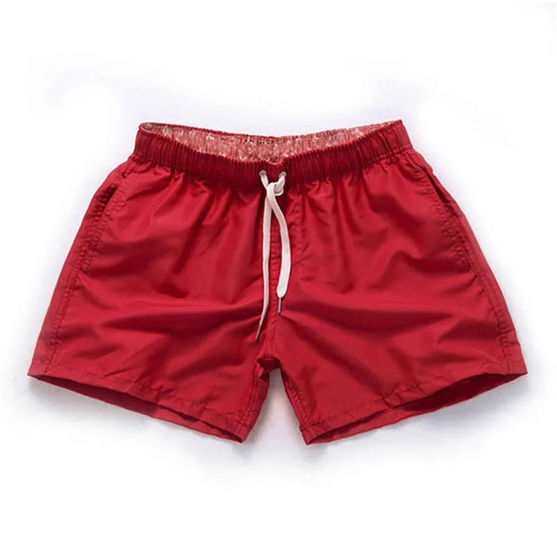 Men's polyester beach shorts in multiple colours with straight leg design for surfing and casual wear
