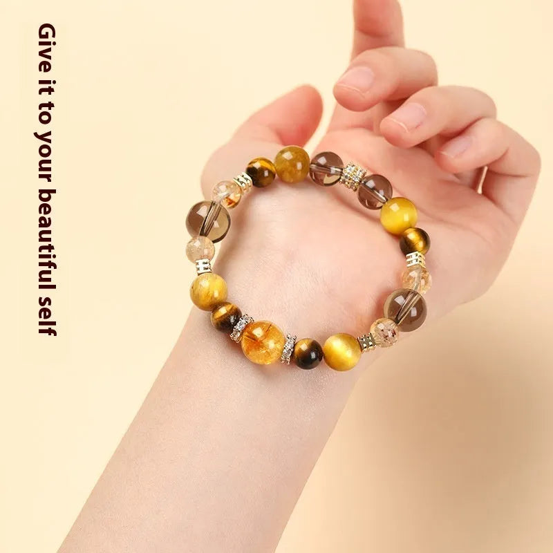 Natural yellow tiger-eye crystal bracelet in geometric tower design showing 10mm and 12mm size options