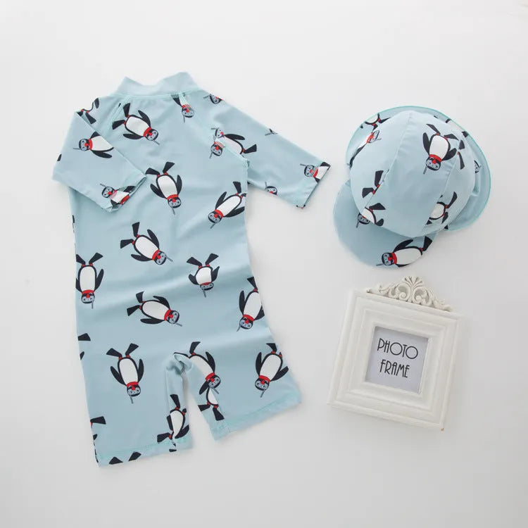 Boys' penguin print long sleeve one-piece swimsuit with matching swimming cap set.