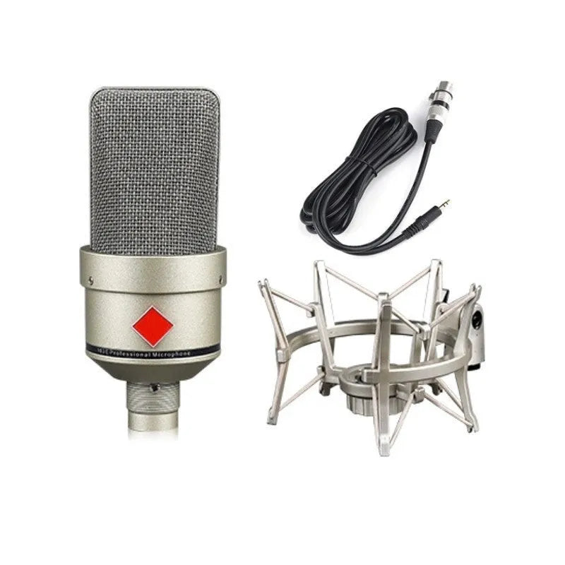Champagne gold wired condenser microphone with stand on a table.