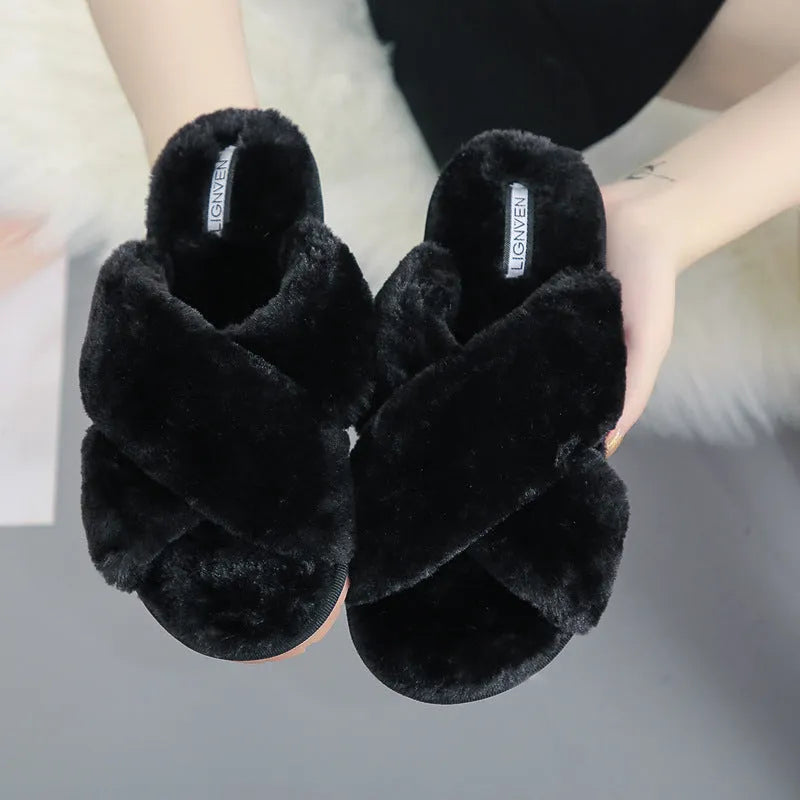 Cross open-toe fur slippers in black on a patterned non-slip sole