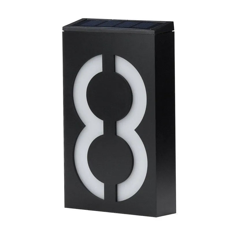 Solar powered house number light with LED illumination and waterproof housing for outdoor installation