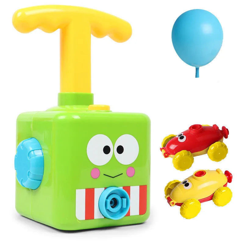 Balloon launch tower toy car with inflated balloon on a white surface