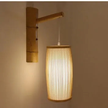 Natural bamboo plait wall lamp with woven design for hall or staircase lighting