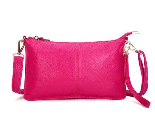 Structured cowhide leather lady slant bag showing front zipper compartment and dual strap options