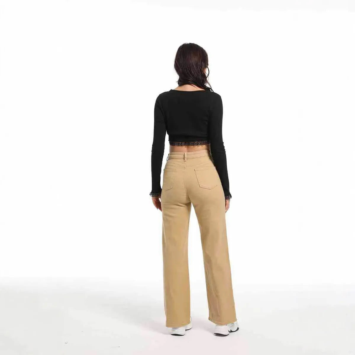 Women's apricot high-waist wide-leg straight jeans on a hanger