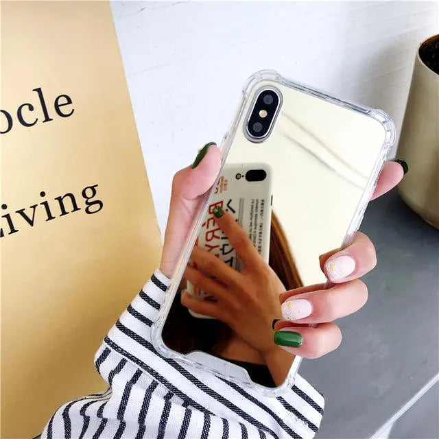 Mirrored back protective TPU case for iPhone on a table