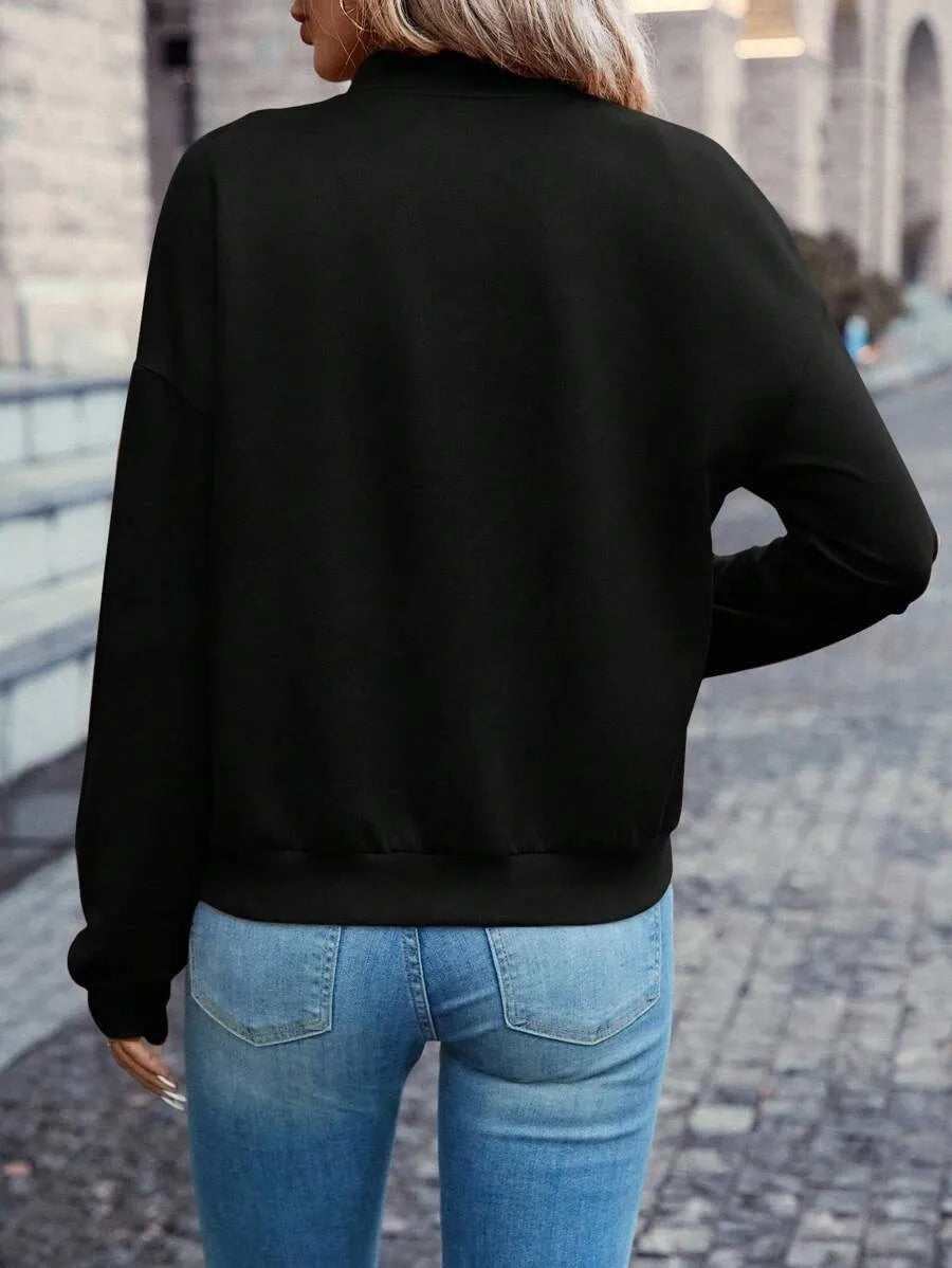 Black women's casual zip jacket with long sleeves and faux pockets