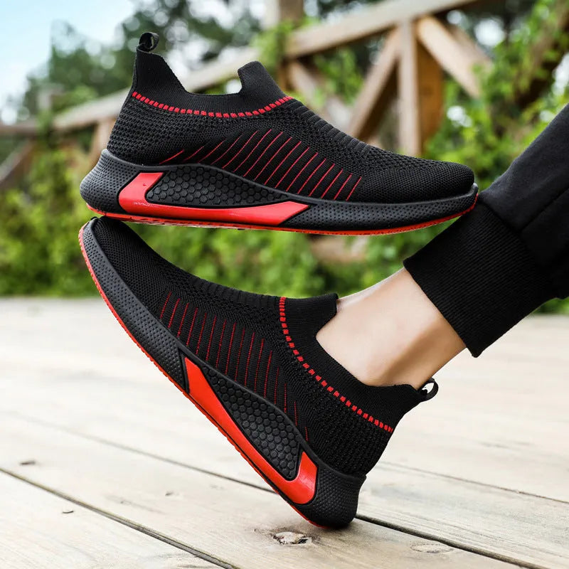 Men's low-top mesh sock sneakers with striped design and Flyknit upper.