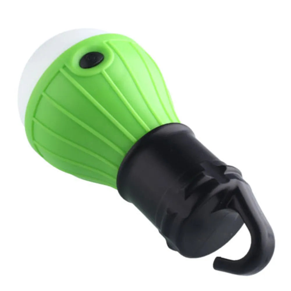 Blue portable LED camping light with a hanging hook, showing scale against a ruler.