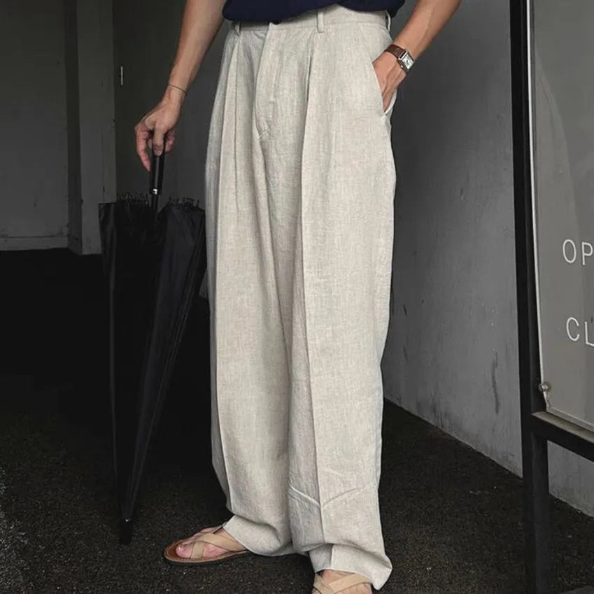 Men's lightweight cotton linen blend trousers in a loose fit, shown in apricot, army green, and purplish blue colours.