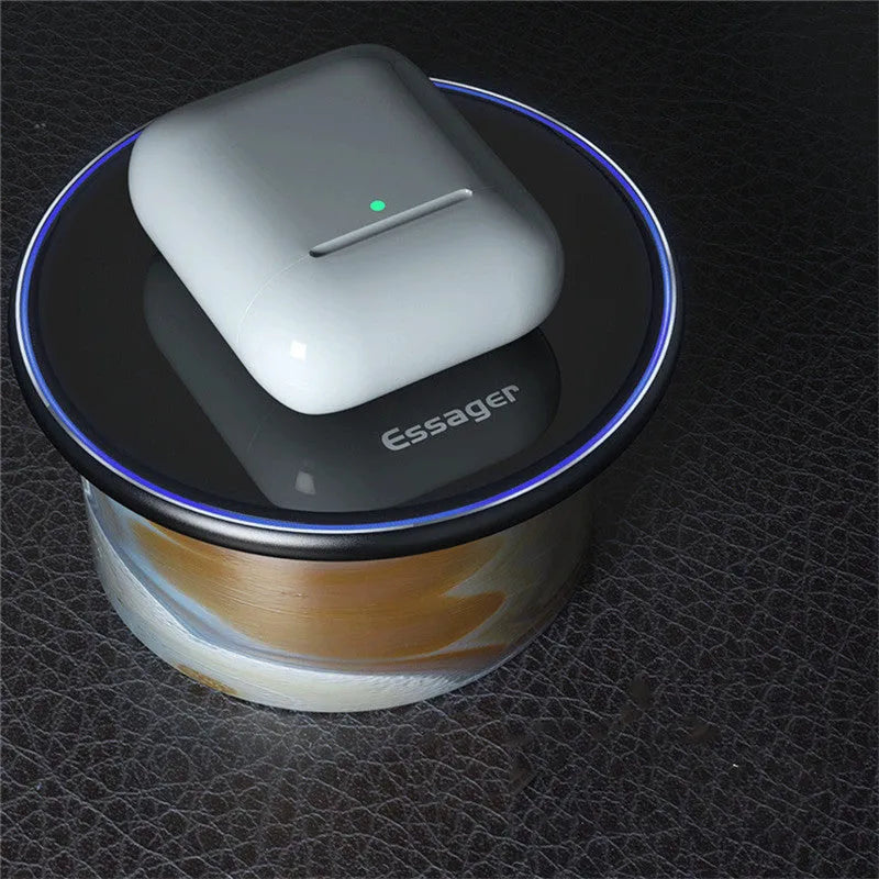 Black or white aluminium alloy 15W Qi wireless charging pad with LED light on a desk.