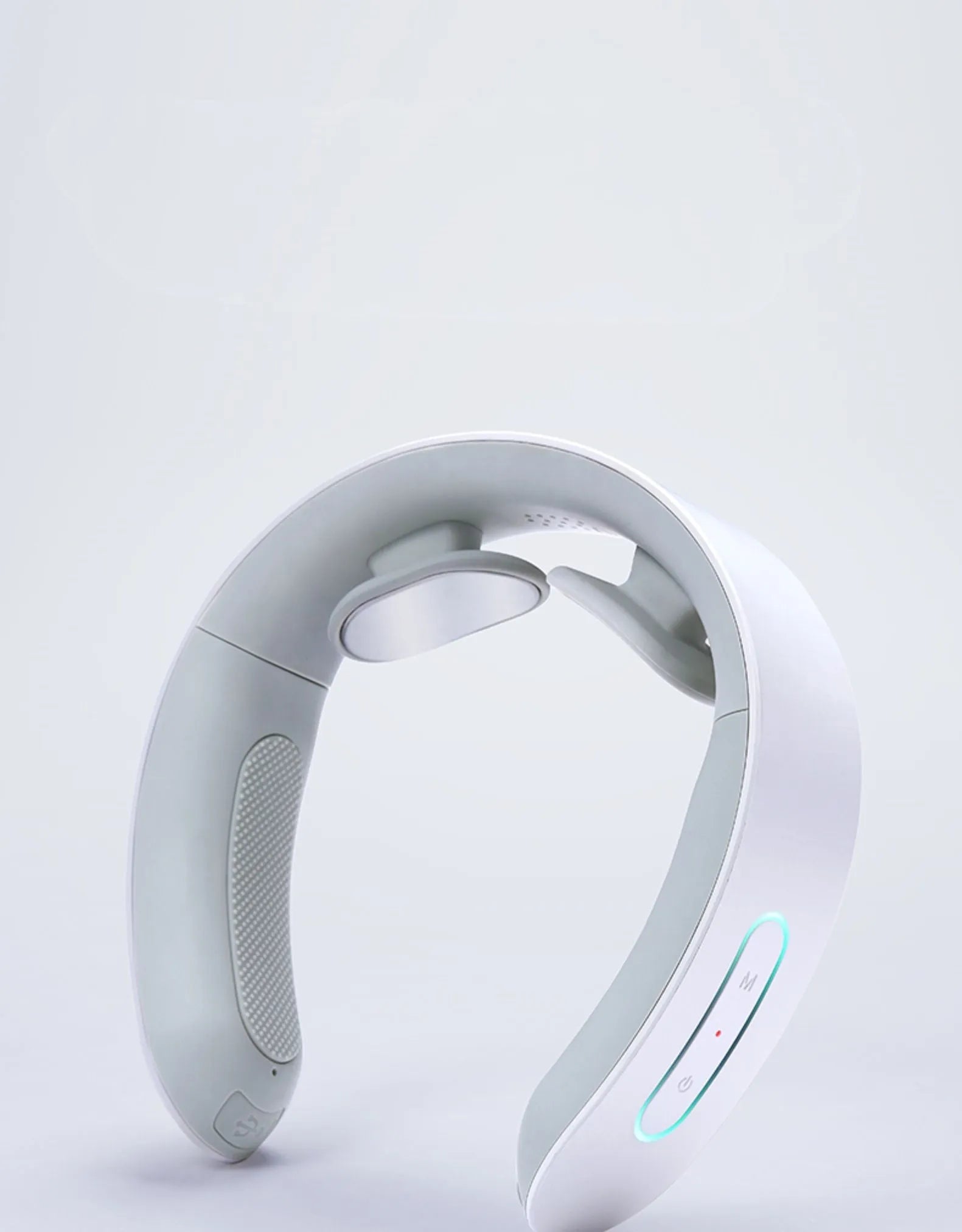 White electric acupressure massager with heat function for back, neck and shoulder pain relief.