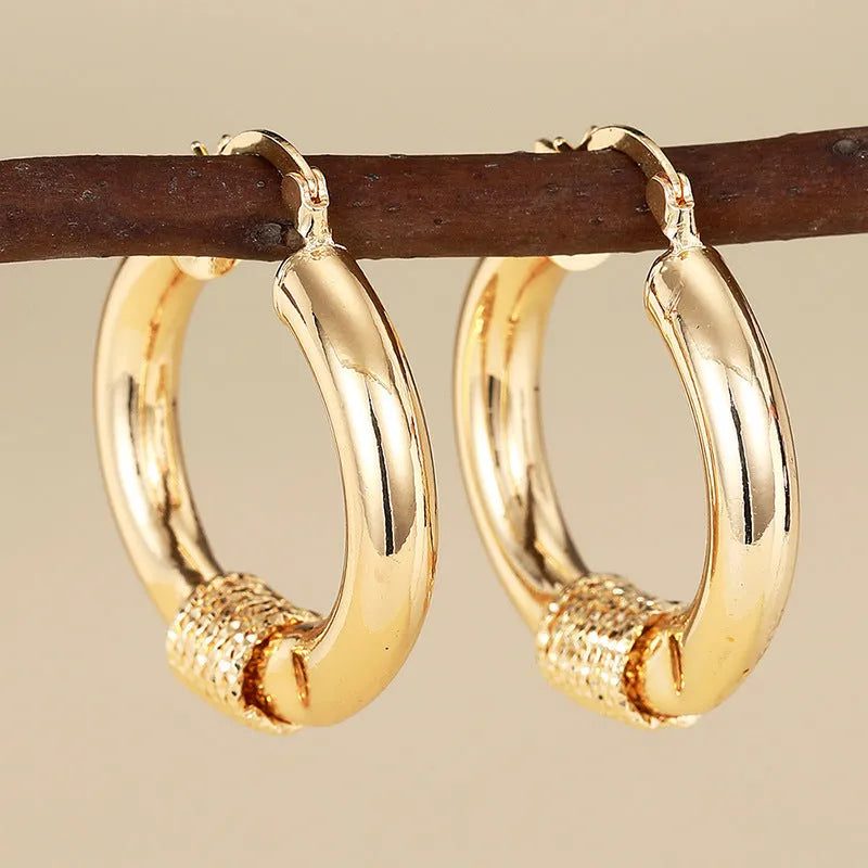Women's geometric ring line copper earrings in golden colour variations
