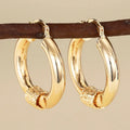 Women's geometric ring line copper earrings in golden colour variations