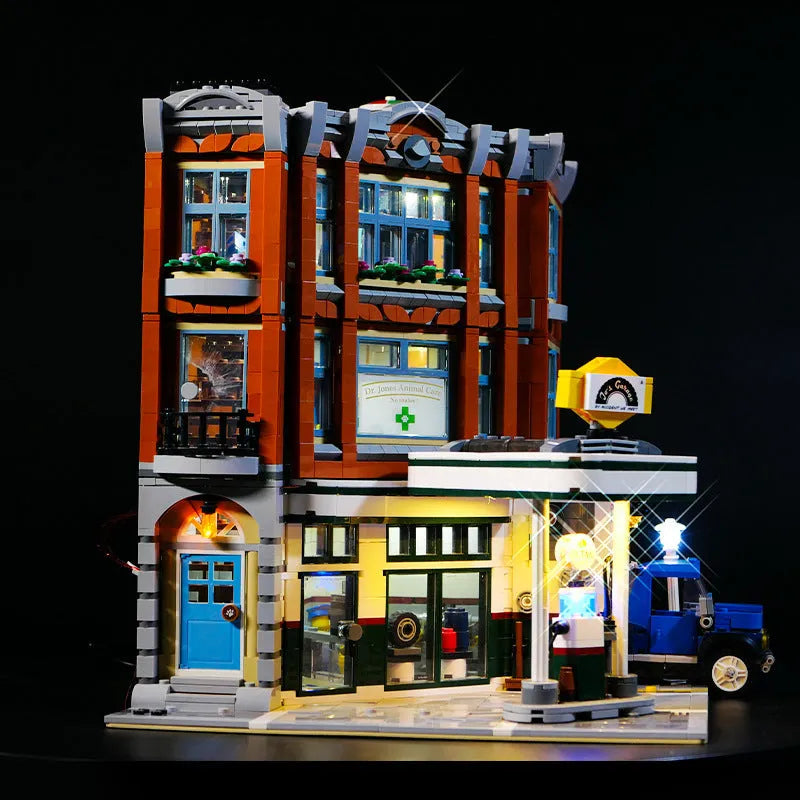 Plastic MOC model LED lighting accessory parts in a corner repair shop theme.