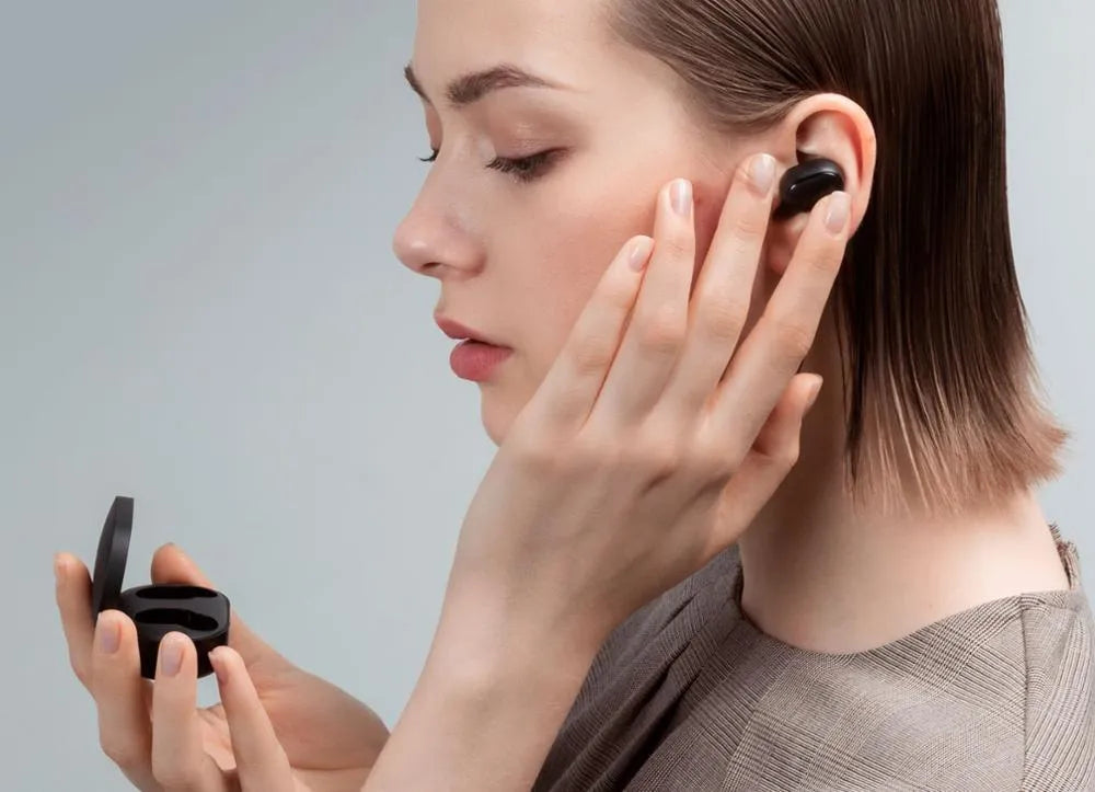 Redmi AirDots 2 Black true wireless earphones with their compact charging case.