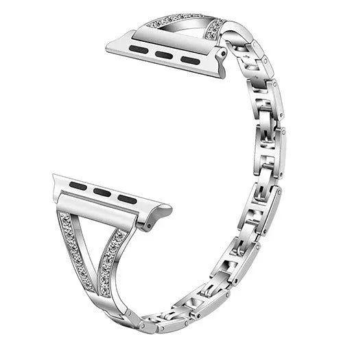 Stainless steel watch band with diamond accents in gold, showing the metal clasp and stud detail.