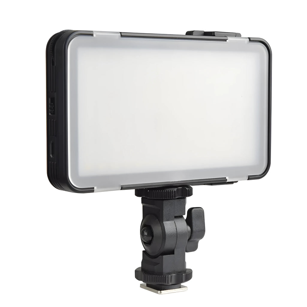 Shenniu M150 ultra-thin LED video light mounted on a mobile phone showing its slim profile.